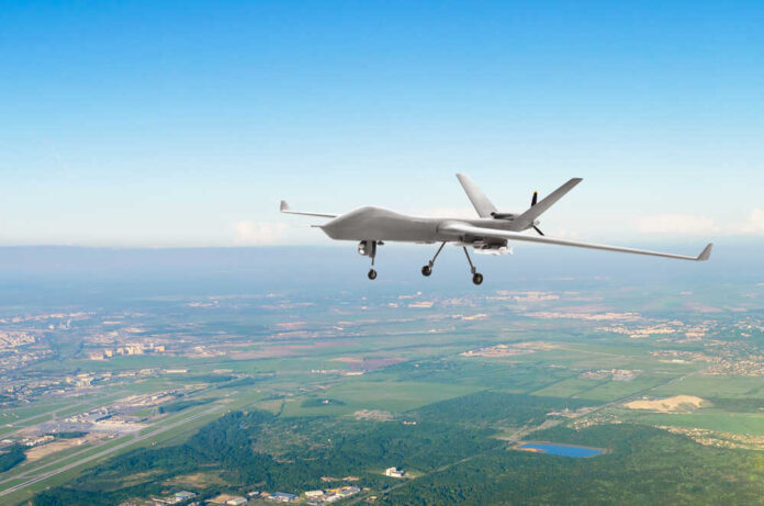 Unmanned,Military,Drone,Uav,On,Patrol,Air,Territory,At,Low