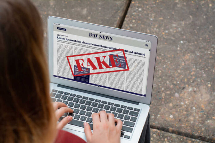 Closeup,Of,Young,Woman,Reading,Digital,Fake,News,On,Laptop.