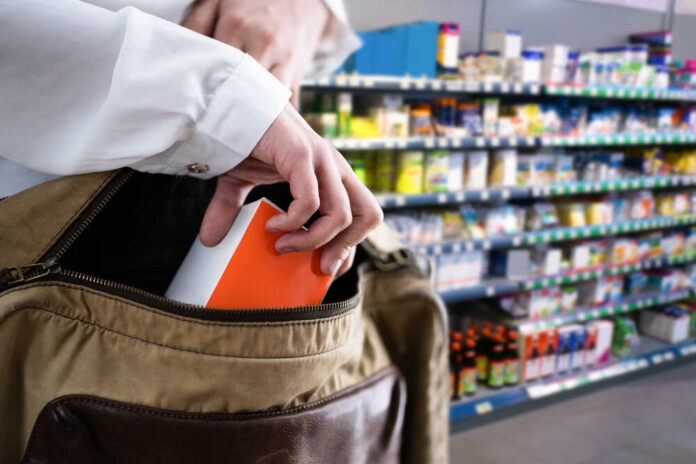 Retail,Shoplifting.,Woman,Stealing,In,Supermarket.,Theft,At,Shop