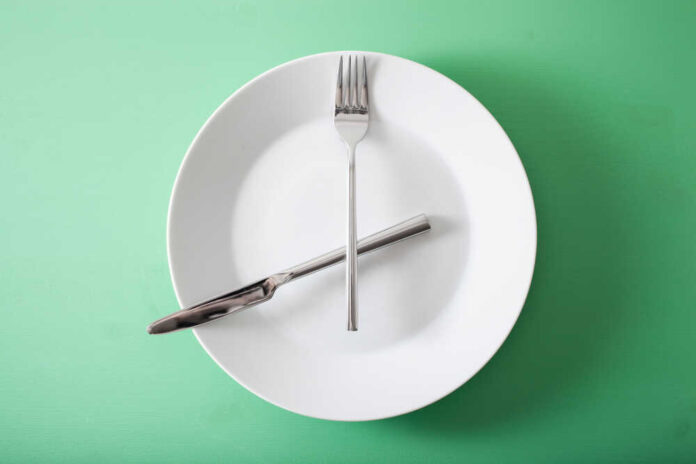 Concept,Of,Intermittent,Fasting,And,Ketogenic,Diet,,Weight,Loss.,Fork