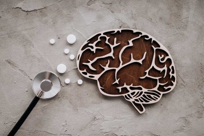 A,Stethoscope,And,Brain,With,Pills.,Awareness,Of,Alzheimer's,,Parkinson's