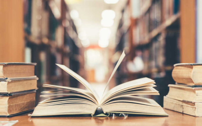 Education,Learning,Concept,With,Opening,Book,Or,Textbook,In,Old