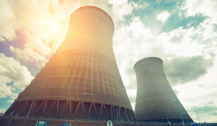 View,Of,Dampierre,Nuclear,Power,Plant,With,Cooling,Towers