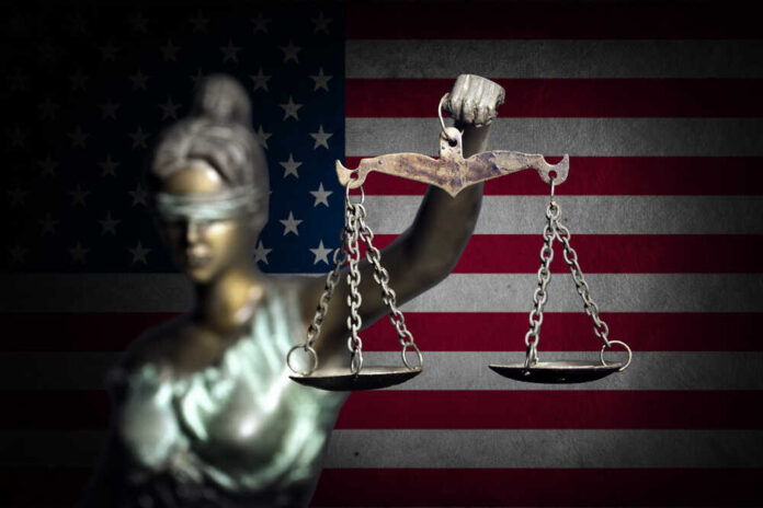 Lady,Justice,With,U.s,Flag,Background