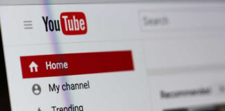 Close-up of YouTube homepage navigation menu.