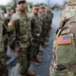 Trump’s “Options Open” Comment Fuels Draft Speculation Military personnel standing in formation outdoors