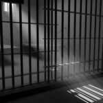 Hollywood Rape Convict Found Dead: Mystery Deepens Sunlight streaming through prison cell bars.
