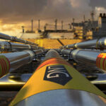 Gas pipelines leading to an industrial ship.