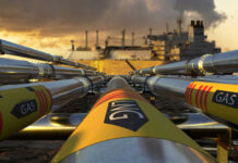 Gas pipelines leading to an industrial ship.