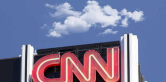 CNN building sign and blue sky background