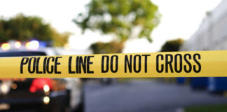 Yellow police tape with text police line do not cross