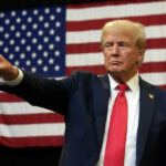 Hollywood’s Quiet Shift: Is Trump Behind It? Man pointing with American flag in background