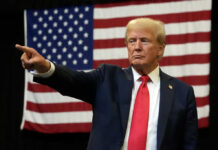 Hollywood’s Quiet Shift: Is Trump Behind It? Man pointing with American flag in background