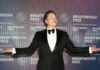 Musk’s Bold Step: Calls Judge’s Neutrality Into Question Man at Breakthrough Prize event in formal attire.