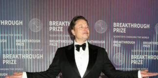 Man at Breakthrough Prize event in formal attire.