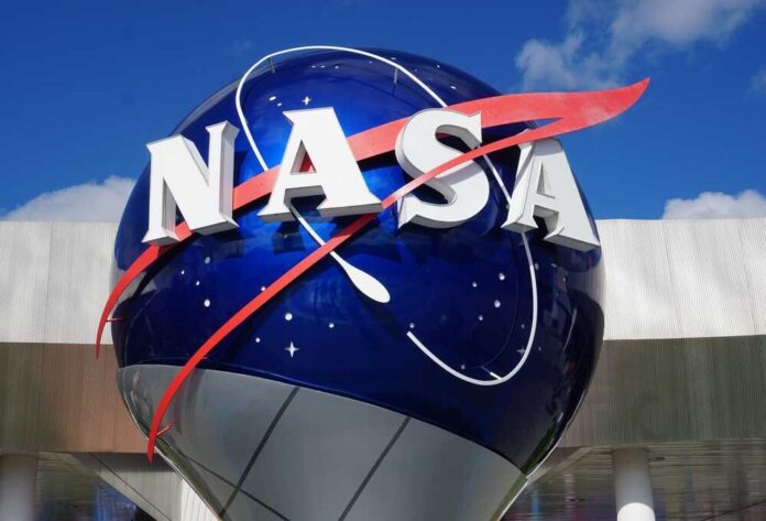 shutterstock_2607099299.jpg NASA logo displayed on a large globe structure