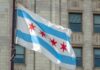 Chicago flag waving in front of a building