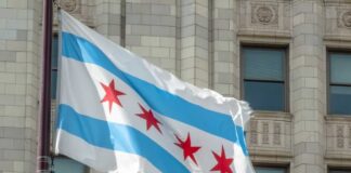 Chicago flag waving in front of a building
