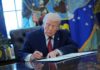 Executive Order Twist: Trump’s Big Move on TSA Pay Donald Trump signing documents in the Oval Office