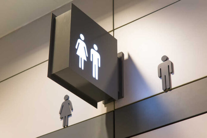 shutterstock_345301628.jpg Restroom sign indicating male and female facilities