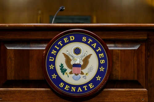 United States Senate emblem on wooden podium front