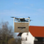 Amazon delivery drone flying with package
