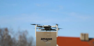 Amazon delivery drone flying with package