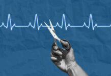 Hand holding scissors near heartbeat line illustration