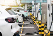 Electric cars charging at a charging station parking.