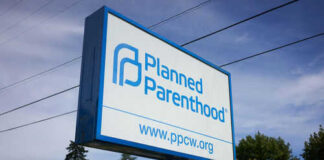 Planned Parenthood sign with website and logo displayed