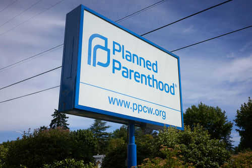 Planned Parenthood sign with website and logo displayed
