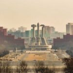 North Korea’s Secret Motive – Trump Diplomacy? View of a large monument surrounded by buildings in Pyongyang