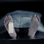 Disturbing Phoenix Crime: Morgue Breach Details Emerge Feet with tag under white sheet in morgue
