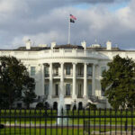 Gun Attack at the White House: The Trump Administration Is Being TARGETED The White House with an American flag flying above it