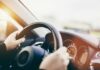 Felony Shock: Ex-Federal Prosecutor in Hit-and-Run Scandal Hands gripping a steering wheel inside a car
