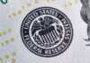 Rate Showdown: Fed Chair Fights ‘Yes Man’ Claims Federal Reserve building exterior with eagle sculpture