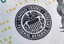 Rate Showdown: Fed Chair Fights ‘Yes Man’ Claims Federal Reserve building exterior with eagle sculpture