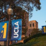 UCLA campus with banners displaying '#1' and 'UCLA' near a historic building