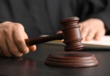 North Carolina’s Court-Ordered Voter Purge: Shocking New Rules A judge's hand holding a gavel above a wooden block