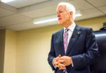 Betrayal Vibes? Senator John Cornyn Drops Cryptic Fable A man in a suit delivering a speech in a conference room