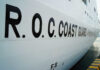 Taiwan Pushback: Chinese Ship Tests Waters, Goes Dark R.O.C. Coast Guard lettering on the side of a white ship at dock