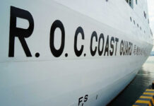 Taiwan Pushback: Chinese Ship Tests Waters, Goes Dark R.O.C. Coast Guard lettering on the side of a white ship at dock