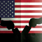 Silhouetted handshake over United States flag background