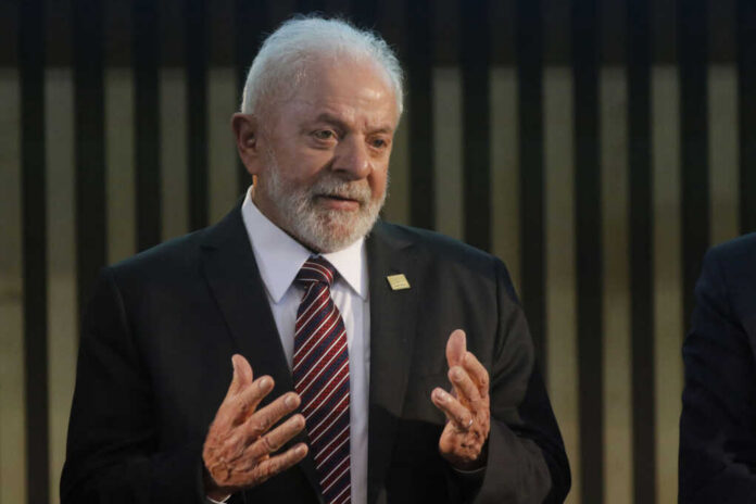 brazilian-president-lula-da-silva-portrait2482053113jpg Elderly man in suit speaking with hands raised