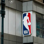 NBA logo sign on a building facade