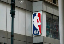 Trump NBA Visit Sparks Fortress-Level Lockdown in NYC NBA logo sign on a building facade