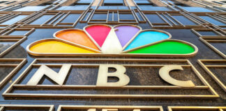 NBC logo with colorful peacock design.