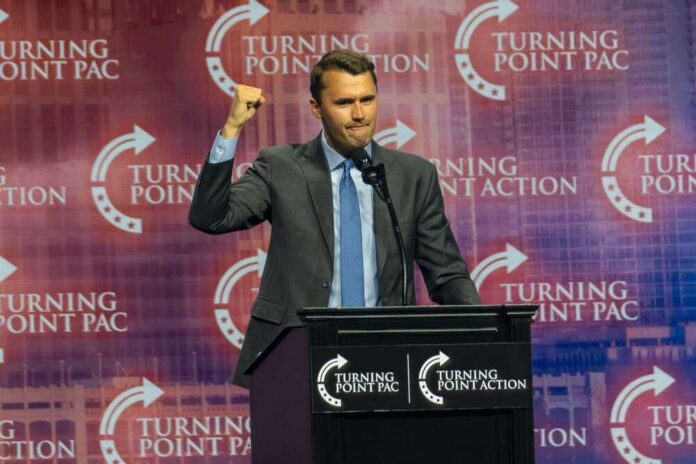 Person speaking at Turning Point USA event podium
