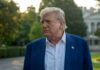 G7 Roadblocks Stall Trump’s Mineral Push A political figure with a serious expression standing outdoors near the White House
