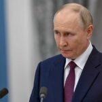 Flamingo Missiles Rattle Russia’s Heartland A serious-looking man in a suit during a press conference